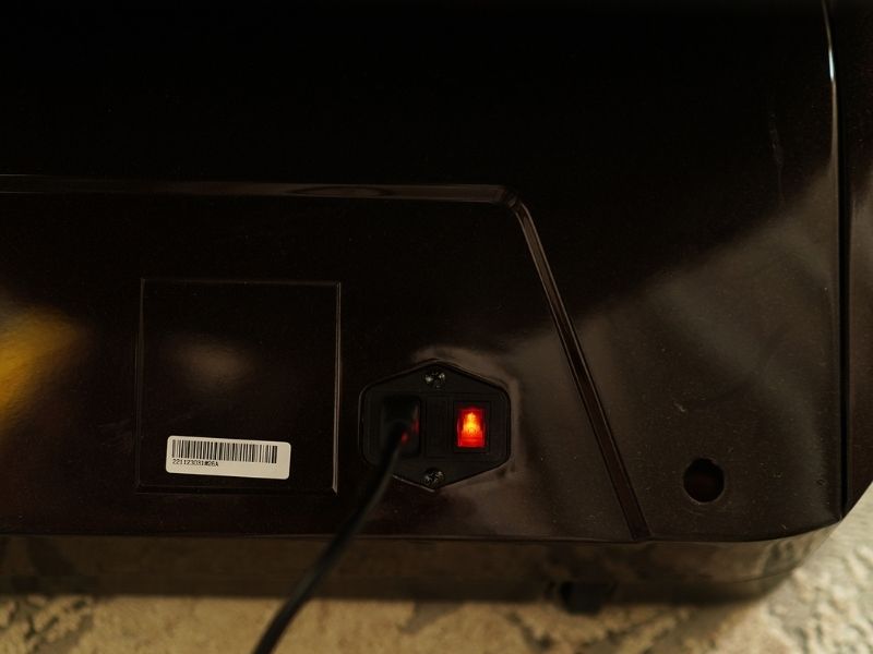 Rút điện và khởi động lại ghế massage để xử lý lỗi